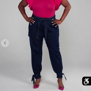 Belted blue jean with tie on leg